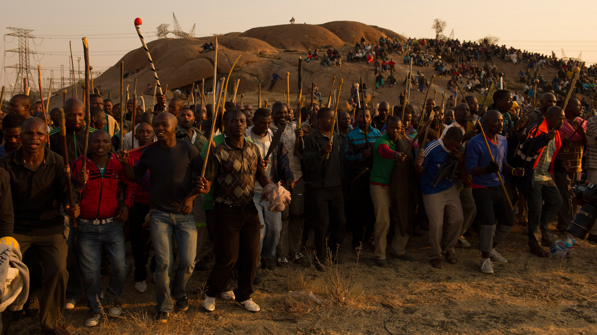 <p>Following violent unrest in South Africa’s mining sector, police echo colonial and apartheid-era militarism. They fire on workers striking at Lonmin’s Marikana Platinum Mine, killing 45 and wounding many more.</p>